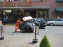 Thumbnail of: Garbageman pushing lots of garbage