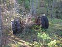 Thumbnail of: Old axle in the woods near Top Bridge Trail