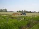Thumbnail of: Tractor along River Rd in Delta