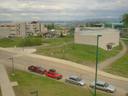 Thumbnail of: View of UNBC (just about all of it) from the student residences, with pulp mill in background