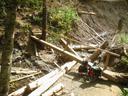 Thumbnail of: My bike, waiting to cross a bridge over a stream